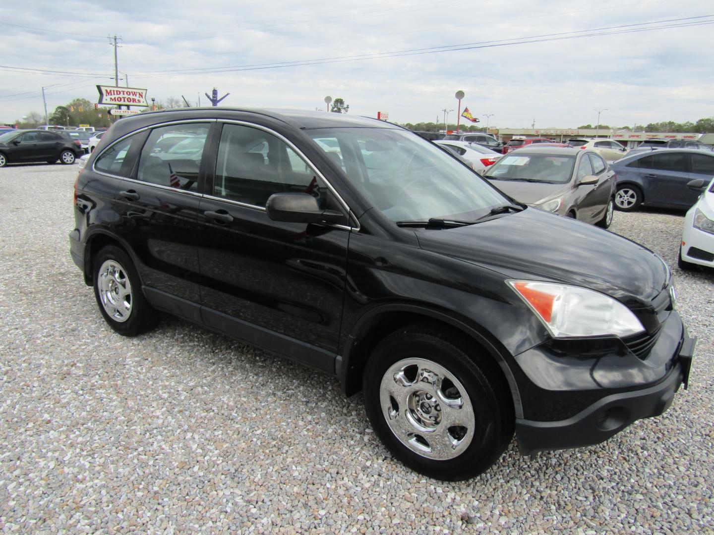 2009 Black Honda CR-V LX 2WD 5-Speed AT (3CZRE383X9G) with an 2.4L L4 DOHC 16V engine, Automatic transmission, located at 15016 S Hwy 231, Midland City, AL, 36350, (334) 983-3001, 31.306210, -85.495277 - Photo#0